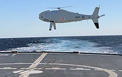 S100 Camcopter VTOL MTUAS flies off HMAS Ballarat. Pic RAN